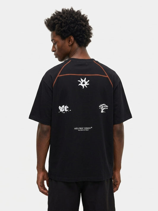 Breezy Oversized Feather Tech Tee