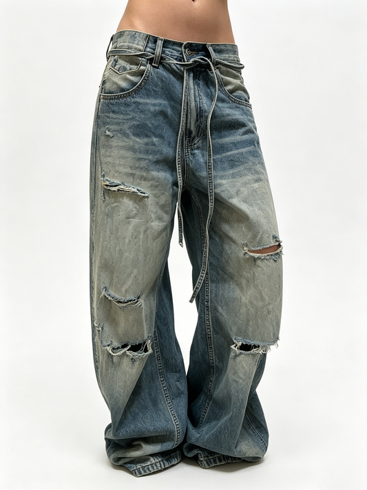 Ace Jolun Washed Whiskered Ripped Curved‑Cut Jeans