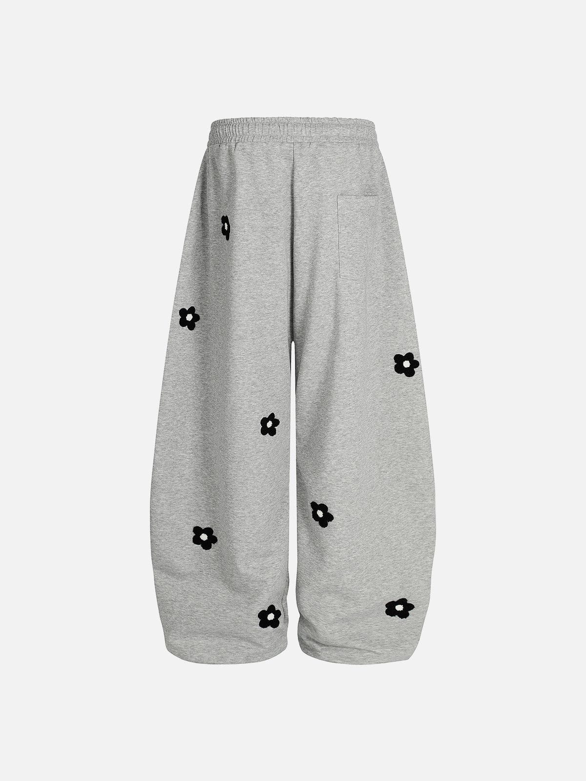 Pantalones deportivos holgados con bordado floral Aelfric Eden
