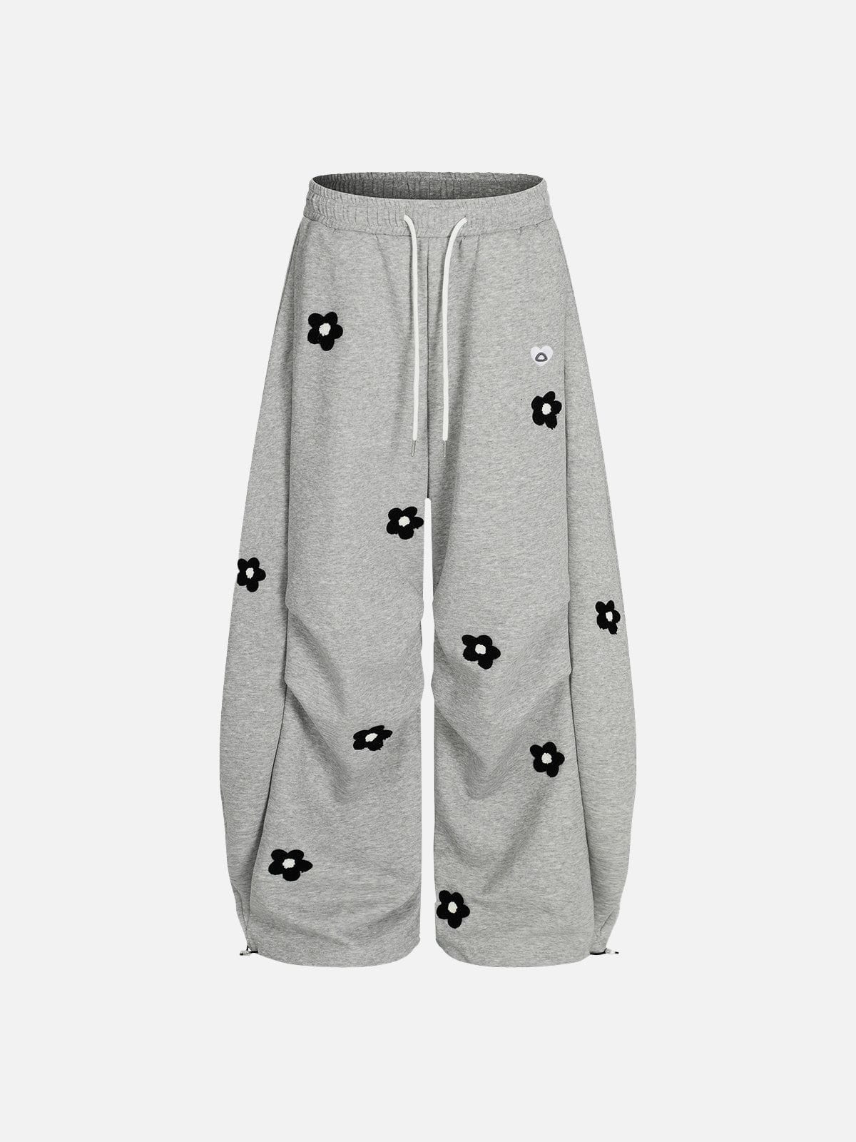 Pantalones deportivos holgados con bordado floral Aelfric Eden