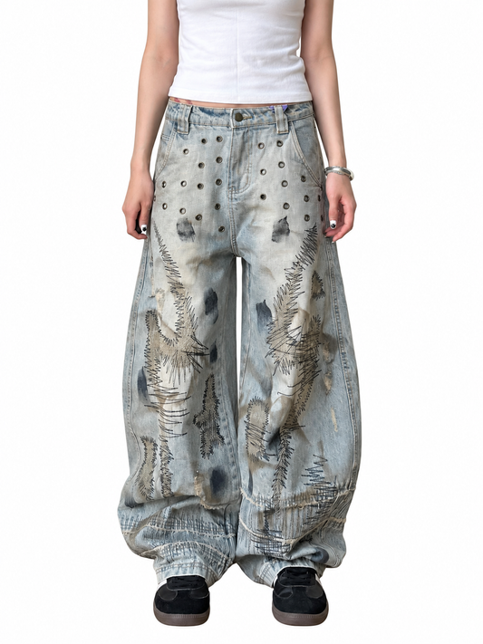 Heavy Embroidered Curved-Leg Jeans product image